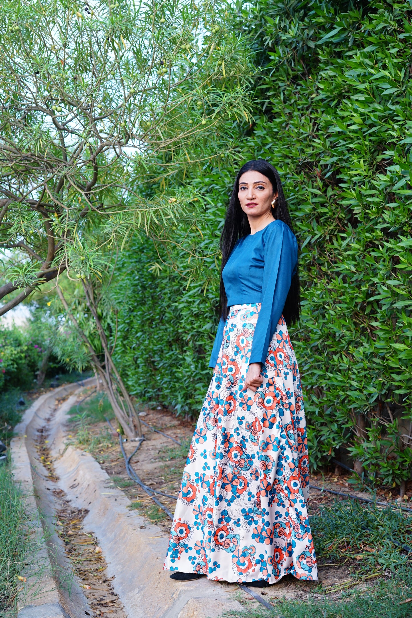 Silk multi-printer skirt with organza plain top.