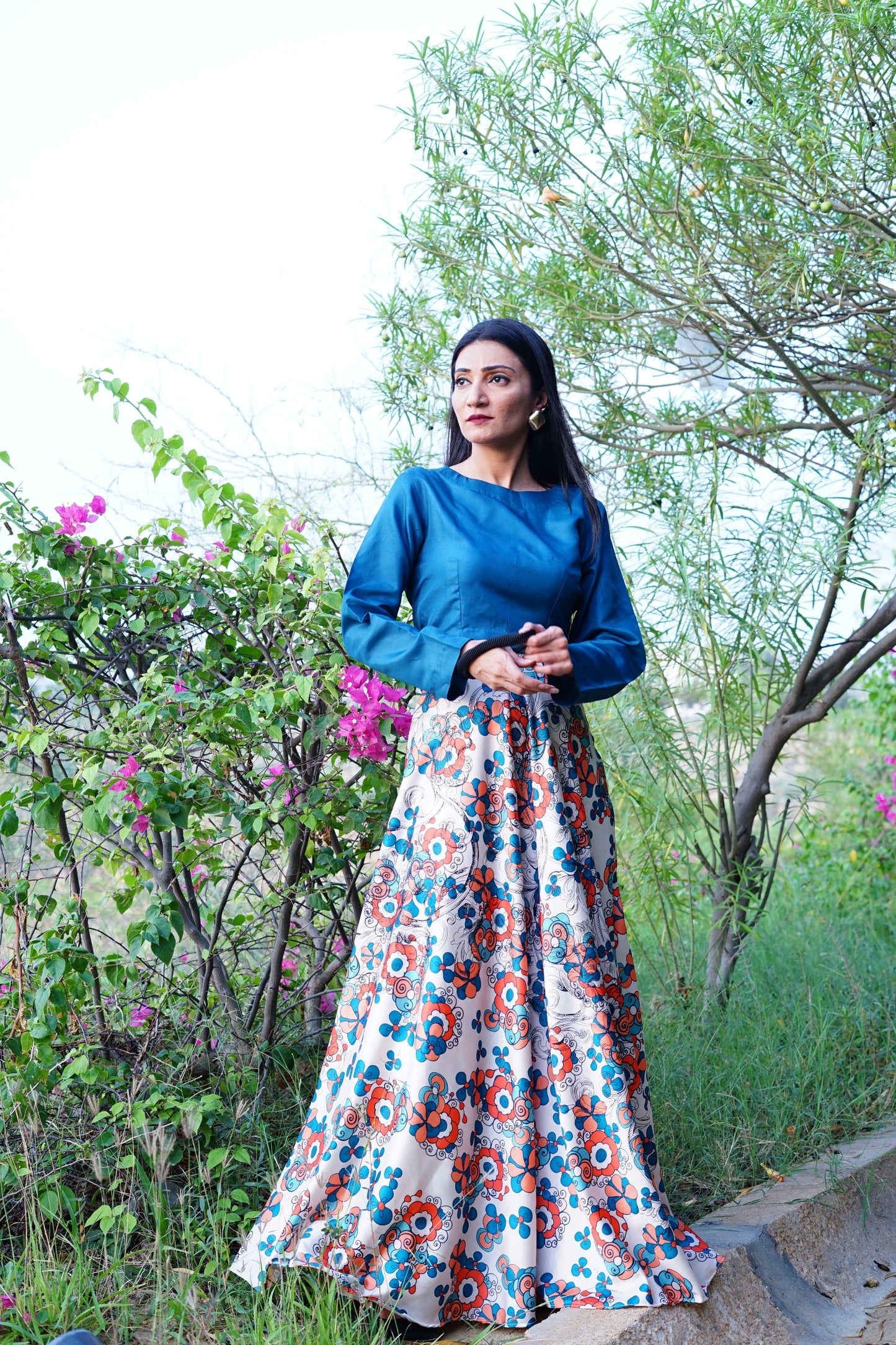 Silk multi-printer skirt with organza plain top.