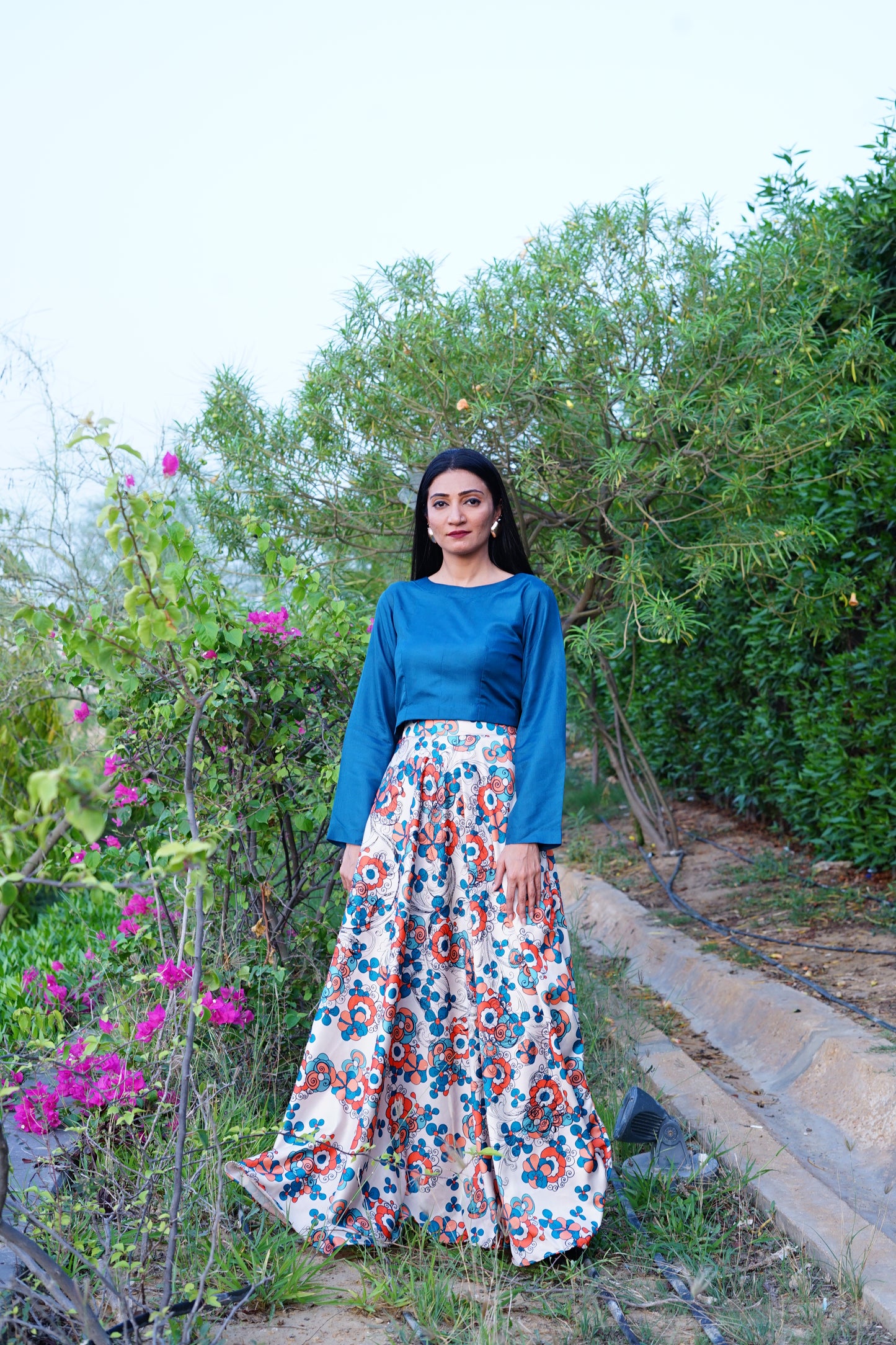 Silk multi-printer skirt with organza plain top.