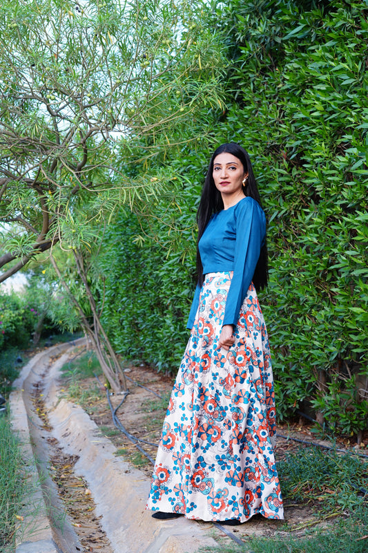 Silk multi-printer skirt with organza plain top.